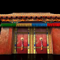 Traditional Storefront Entrance with Red Double Doors Golden Decorations and Colorful Tassels