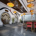 Traditional Chinese Restaurant Interior Featuring Circular Archway Yellow Lanterns Red Chairs And Ink Paintings