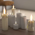 Lit Candles With Dripping Wax On Wooden Table Creating Cozy Ambiance