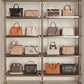 Stylish Designer Handbags Collection With Various Styles Colors And Designs On Shelves