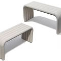 Two White Upholstered Sofa Benches With Curved Modern Design And Textured Surface