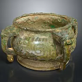 Ancient Bronze Ritual Vessel With Beast Head Handles Spiral Patterns And Three Legs