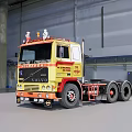 Yellow Volvo Truck With Northstar Writing Parked In Industrial Indoor Space