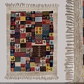 Vibrant Patchwork Square Rug Featuring Animal Geometric Patterns And Fringed Edges