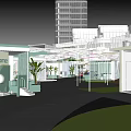 Modern Commercial Street With Green Landscaping Pedestrian Walkways And Buildings