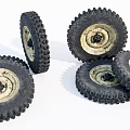 Off Road Tires With Deep Tread And Worn Rubber Stacked Together