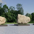 Natural Large Stones Placed On Wooden Bases In Outdoor Area With Green Trees