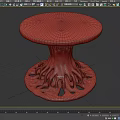 Round Brown Dining Table With Intricate Root Like Base And Carved Details