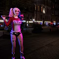 Harley Quinn Character With Colored Pigtails Holding Baseball Bat And Roller Skates