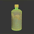 Elegant Artisanal Beverage in Golden Bottle with Green Decorative Leaf Design