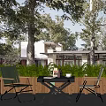 Green and Beige Outdoor Chairs With Wooden Table Lush Plants in Garden Patio Setting