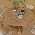 Round Wooden Dining Table With Parquet Top And Four Wicker Chairs Indoor