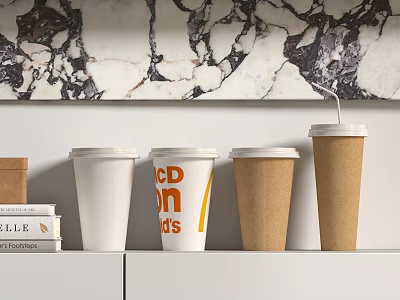 White And Brown Paper Cups With DONUTS Logo On White Shelf Against Marble Wall 3d model