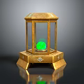 Ornate Golden Lantern Shaped Display Case With Green Orb And Decorative Base