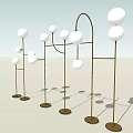 Modern Floor Lamps With Spherical White Shades And Metal Bases In Interior Setting
