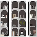 Modern Elegant Decorative Cabinet With Arched Shelves Displaying Books Vases Clock And Sculptures