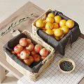 Fresh Red Apples and Yellow Lemons in Wicker Baskets on Wooden Table with Olive Branch