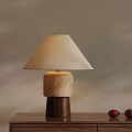 Modern Table Lamp With Beige Lampshade And Wooden Base On Table With Red Decorative Items 3d model
