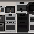Modern Kitchen Appliances Display Featuring Microwaves And Ovens In Black White
