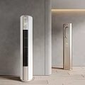 Modern Tower Air Conditioner Fan in Silver and Gold with Digital Display on Gray Wall
