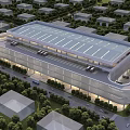 Modern Industrial Factory Building With Large Glass Facade Roof Structure Surrounding Trees And Roads