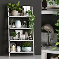 Elegant Decorative Items Set On Shelf With Green Plants Ceramic Vases And Sculptures