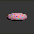 Delicious Orange Donut With Pink Frosting And Colorful Sprinkles On Black