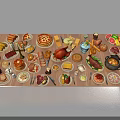 Assorted Delicious Foods on Table with Meats Fruits and Pastries