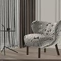 Elegant Abstract Pattern Lounge Chair With Wooden Legs And Side Table Near Window Curtains