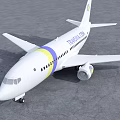 Transavia Airliner White With Yellow And Blue Stripes Parked On Airport Runway Under Cloudy Sky