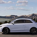 White Audi Car Parked On Road With Scenic Mountain Background Outdoor View