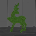 Topiary Bush Shaped as Deer Against Grey Wall and Wooden Floor