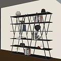 Modern Geometric Black Bookshelf With Multiple Shelves Holding Books And Decorative Vases