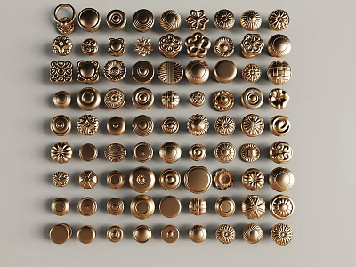 Golden Carved Decorative Buttons with Ornate Patterns Arranged Neatly on 3d model