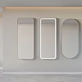 Stylish Modern Various Shaped Mirrors Hanging On Wall In Interior Space