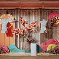 Window Display With Wooden Lattice Backdrop Mannequins Floral Decorations Colorful Fans And Decorative Mountain Shapes