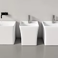 Three Modern White Square Bathroom Sinks With Faucets And Water Flowing