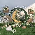 Outdoor Photo Check In Spot With Green Grass And Circular Ring Flower Decorations