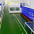 Industrial Factory Interior With Green Floor Yellow Railings And Data Display Boards