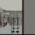 Modern Clothing Store with Window Display and Mannequins Showcasing Fashion Outfits and Interior Design