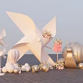 Scenic Photo Spot with White Windmills Golden Snail Sculpture Pink Signboard and Ocean View