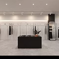 Modern Clothing Store Interior With Clothes On Racks Mirror Sofa And Display Table