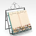 Decorative Metal Storage Shelf with Open Recipe Notebook and Ornate Top Scroll Design