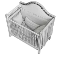 Cozy Wooden Baby Crib With Padded Headboard Soft Pillows And Elegant Design