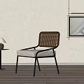 Modern Leisure Chair With Rattan Back Metal Frame Upholstered Seat In Minimalist Interior With Lamp