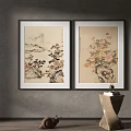Two Framed Paintings Landscape And Floral Artwork On Gray Wall With Decorative Object