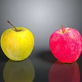 Fresh Yellow And Red Apples Placed On Black Surface With Reflection