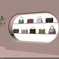 Stylish Designer Handbags In Various Colors Displayed On Modern Shelves With Pink Background