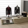Elegant Men's Suits And Formal Shirts On Mannequins With Display Case Accessories