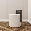 Modern White Round Bedside Table With Black Woven Accent And Herringbone Wooden Floor
